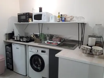Cuisine ou kitchenette dans l'établissement STAYHOME BZH - Cœur Finistère
