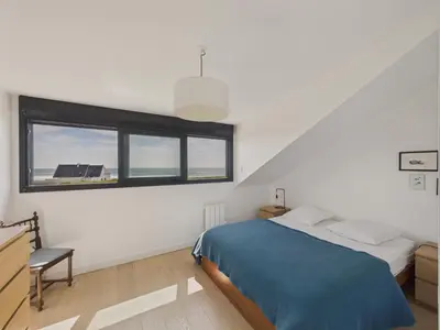 Un ou plusieurs lits dans un hébergement de l'établissement Vue mer - maison pour 5 adultes et 2 enfants