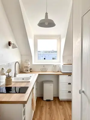 Cuisine ou kitchenette dans l'établissement Le Petit Cottage - Appartement Centre-Ville & Plage
