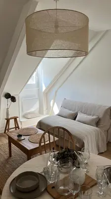 Coin salon dans l'établissement Le Petit Cottage - Appartement Centre-Ville & Plage