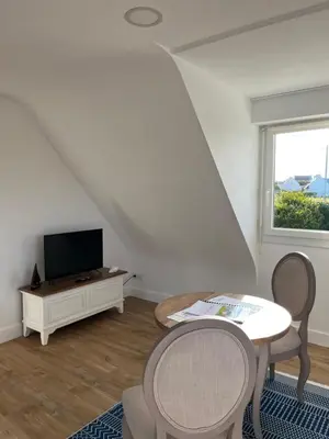 Télévision ou salle de divertissement dans l'établissement La Ligne d'Horizon