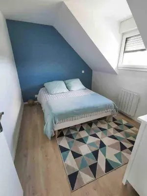 Un ou plusieurs lits dans un hébergement de l'établissement appartement deux chambres avec balcon et petite terrasse