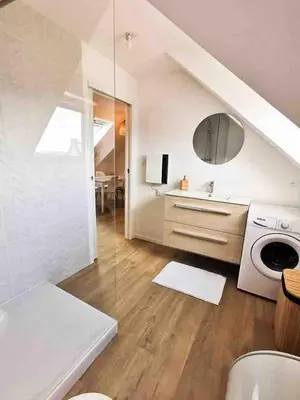 Un ou plusieurs lits dans un hébergement de l'établissement appartement deux chambres avec balcon et petite terrasse
