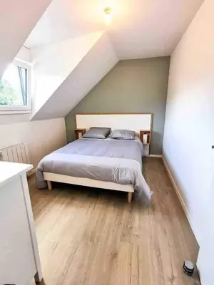 Un ou plusieurs lits dans un hébergement de l'établissement appartement deux chambres avec balcon et petite terrasse
