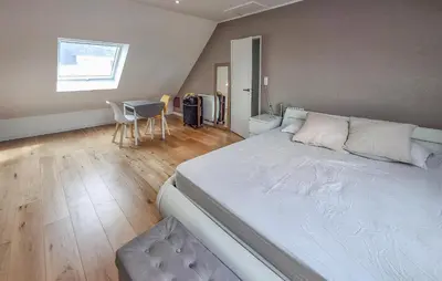 Un ou plusieurs lits dans un hébergement de l'établissement Maison Avec Piscine Vue Mer