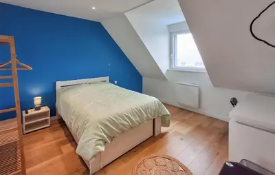 Un ou plusieurs lits dans un hébergement de l'établissement Maison Avec Piscine Vue Mer