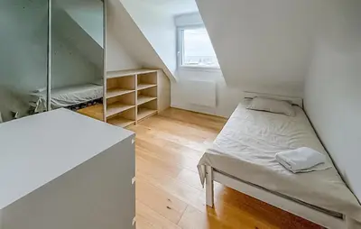 Un ou plusieurs lits dans un hébergement de l'établissement Maison Avec Piscine Vue Mer