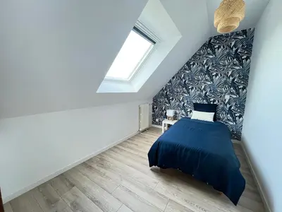 Un ou plusieurs lits dans un hébergement de l'établissement La maison de Louise