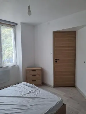 Un ou plusieurs lits dans un hébergement de l'établissement Maison vue mer, 2 chambres au Conquet