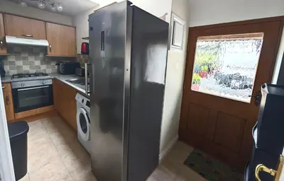 Cuisine ou kitchenette dans l'établissement Charmante petite maison de campagne