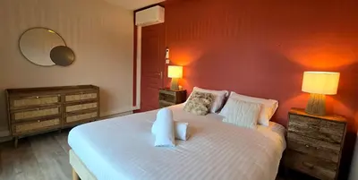 Un ou plusieurs lits dans un hébergement de l'établissement Maison vue mer Posto Home Crozon
