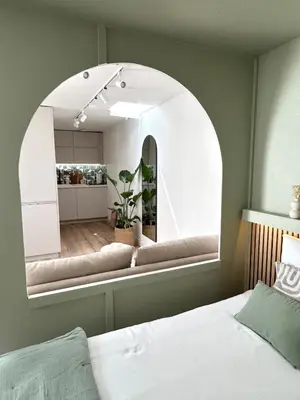 Un ou plusieurs lits dans un hébergement de l'établissement Studio Cosy - Centre-ville