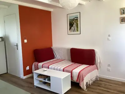 Un ou plusieurs lits dans un hébergement de l'établissement Chez Éliane au bord de la mer