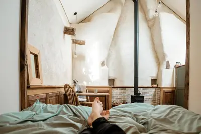 Un ou plusieurs lits dans un hébergement de l'établissement Hagwood - Gîte magique, romantique et insolite