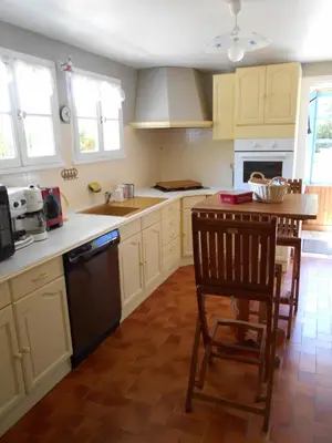 Cuisine ou kitchenette dans l'établissement Ty Papy