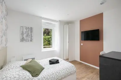 Télévision ou salle de divertissement dans l'établissement Chambre indépendante Risée