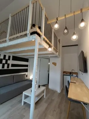 Cuisine ou kitchenette dans l'établissement Mezzanine Clarette