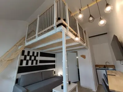 Télévision ou salle de divertissement dans l'établissement Mezzanine Clarette