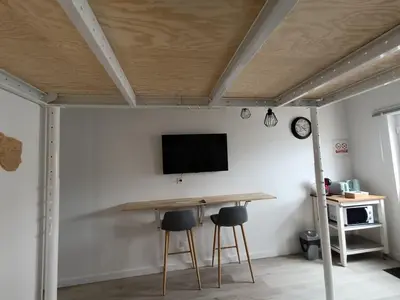 Télévision ou salle de divertissement dans l'établissement Mezzanine Clarette