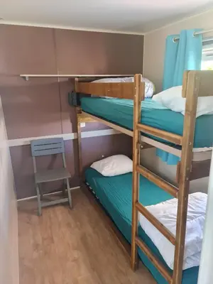 Un ou plusieurs lits dans un hébergement de l'établissement Mobilhome Océalia T3