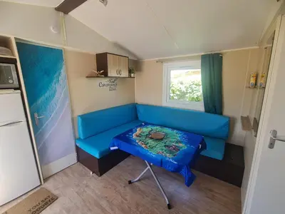 Coin salon dans l'établissement Mobilhome Océalia T3