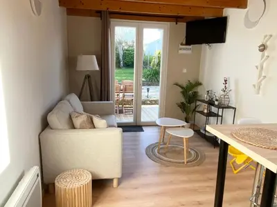 Coin salon dans l'établissement Tiny house proche de la Plage