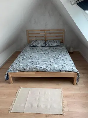 Un ou plusieurs lits dans un hébergement de l'établissement Tiny house proche de la Plage