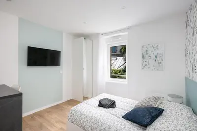 Un ou plusieurs lits dans un hébergement de l'établissement Chambre indépendante Cormoran