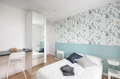 Un ou plusieurs lits dans un hébergement de l'établissement Chambre indépendante Sterne
