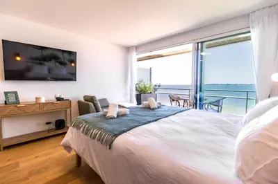 Un ou plusieurs lits dans un hébergement de l'établissement Valinor - Charming studio - Concarneau beach