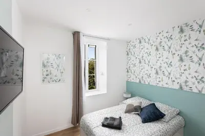 Un ou plusieurs lits dans un hébergement de l'établissement Chambre indépendante Goeland