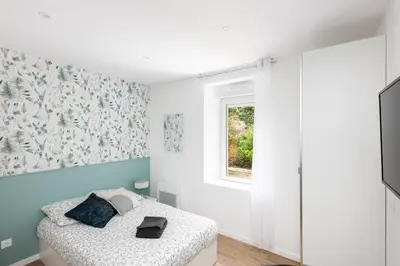 Un ou plusieurs lits dans un hébergement de l'établissement Chambre indépendante Foù de Bassan