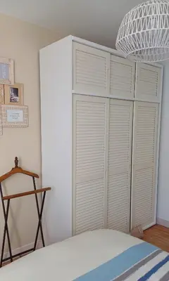 Un ou plusieurs lits dans un hébergement de l'établissement Chambre cosy