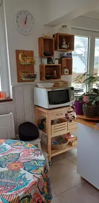Cuisine ou kitchenette dans l'établissement Chambre cosy