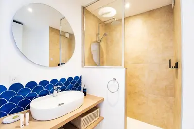 Salle de bains dans l'établissement Flots Bleus - Cozy Studio - White Sand Beach