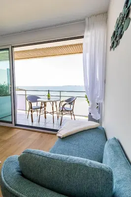 Coin salon dans l'établissement Flots Bleus - Cozy Studio - White Sand Beach