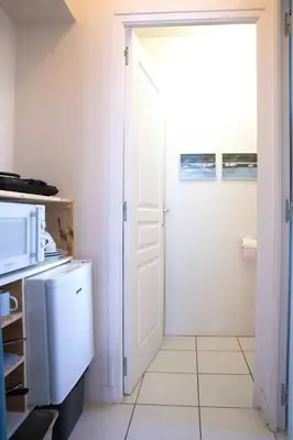 Cuisine ou kitchenette dans l'établissement Le Pénity, studio lumineux à Carnoët