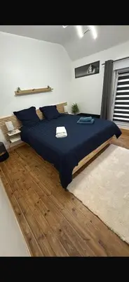 Un ou plusieurs lits dans un hébergement de l'établissement Maison 2chambres dressing bureau jardin clos pour 4 Personnes