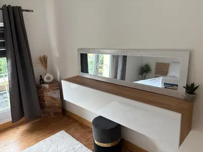 Un ou plusieurs lits dans un hébergement de l'établissement Maison 2chambres dressing bureau jardin clos pour 4 Personnes