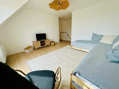 Coin salon dans l'établissement Maison neuve proche des plages