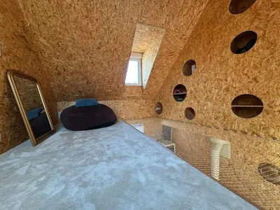 Un ou plusieurs lits dans un hébergement de l'établissement Maison atypique, au coeur de Sainte Marine