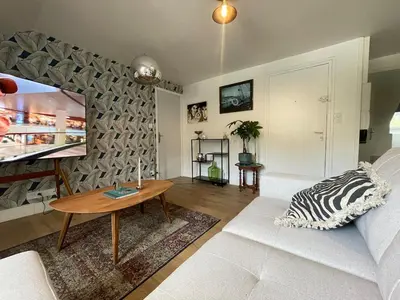 Télévision ou salle de divertissement dans l'établissement Morlaix appartement centre-ville