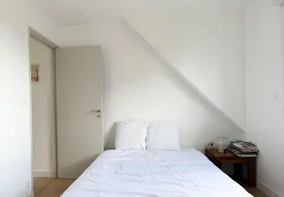 Un ou plusieurs lits dans un hébergement de l'établissement Maison rénovée, Sainte Marine à 100 m de la plage