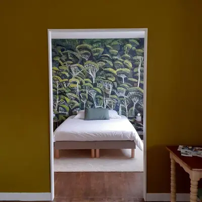 Un ou plusieurs lits dans un hébergement de l'établissement Les Chambres de Kérity