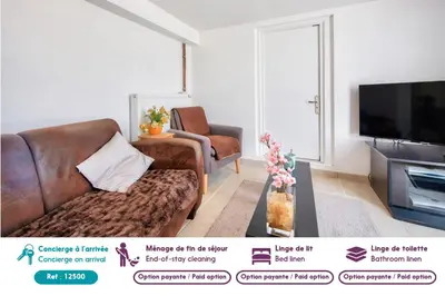 Télévision ou salle de divertissement dans l'établissement 100m de la plage - Appart avec jardin pour 5