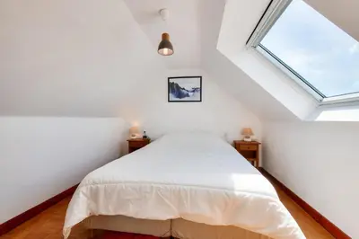 Un ou plusieurs lits dans un hébergement de l'établissement Vue mer - 100m de la plage - 4 adultes 1 enfants