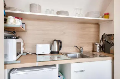 Cuisine ou kitchenette dans l'établissement Vue mer - 100m de la plage - 4 adultes 1 enfants