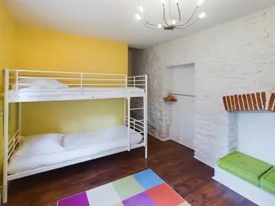 Un ou plusieurs lits dans un hébergement de l'établissement -STONE- Maison de Ville a Concarneau