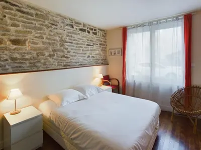 Un ou plusieurs lits dans un hébergement de l'établissement -STONE- Maison de Ville a Concarneau