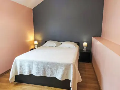 Un ou plusieurs lits dans un hébergement de l'établissement Holiday Home Le Brieux by Interhome